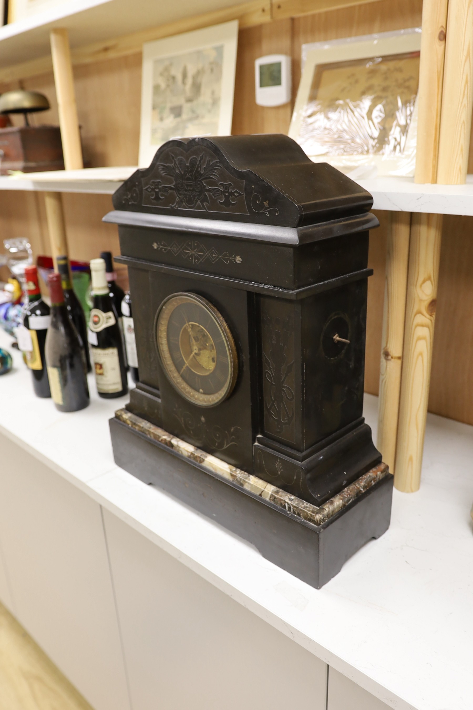 A large Victorian black slate mantel clock, 54.5cms high